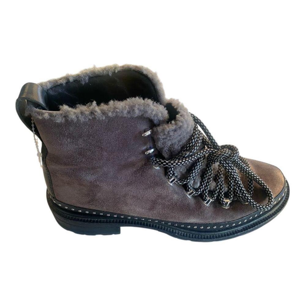 Elegant black leather boots featuring